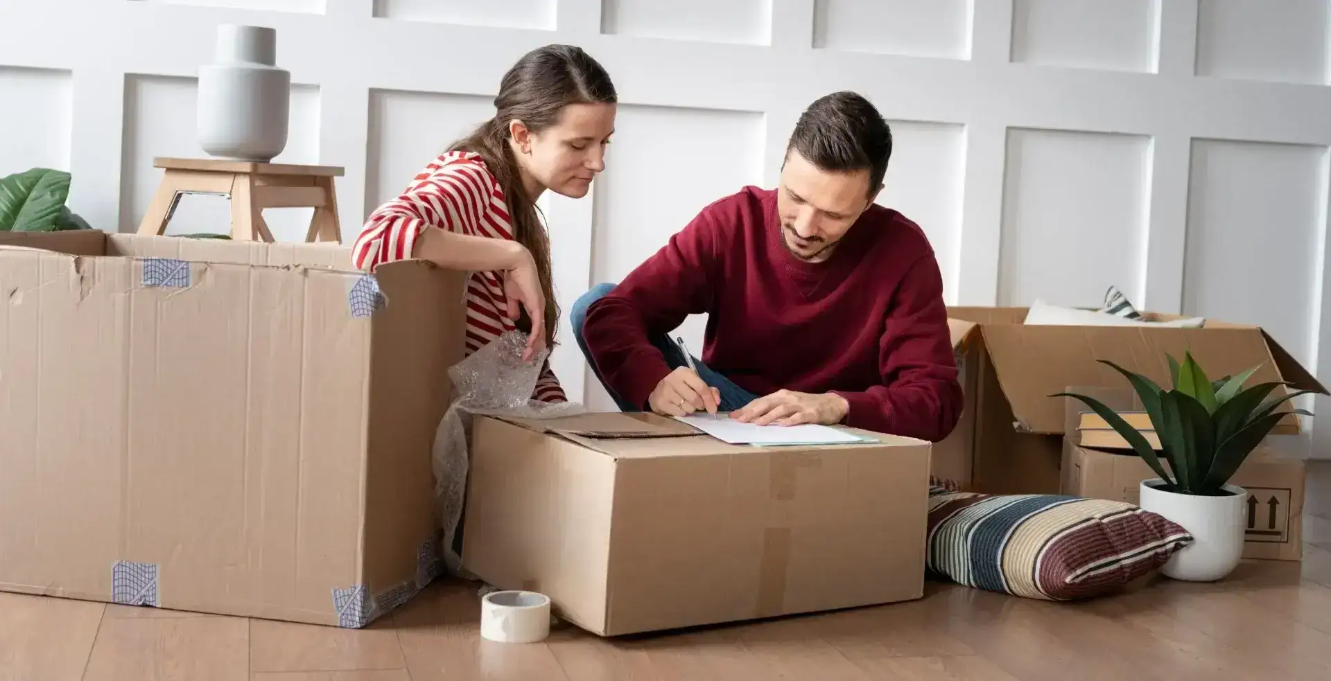 Professional packers and movers team loading household items in Silchar and Bangalore